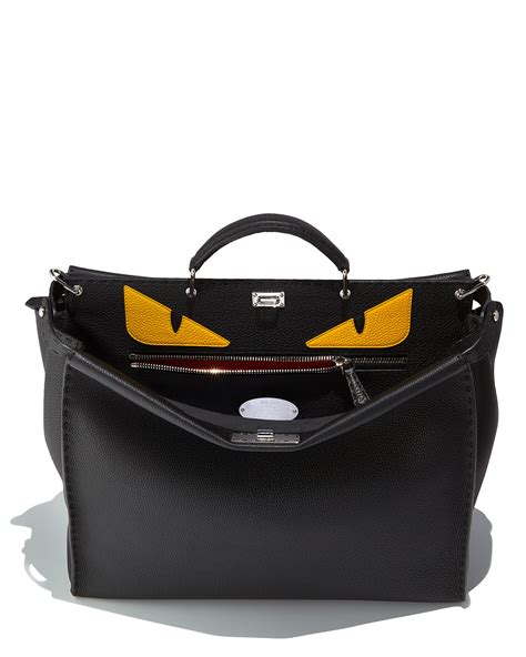 fendi monster eyes peekaboo bag black yellow|Fendi monster eyes peekaboo bag.